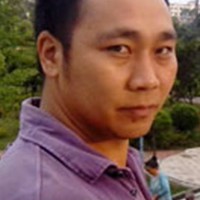 周盅光